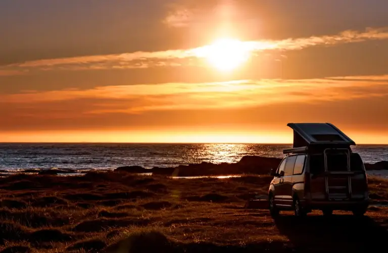 Gonzaga Bay Run 1 Campervan parked on a beach at sunset